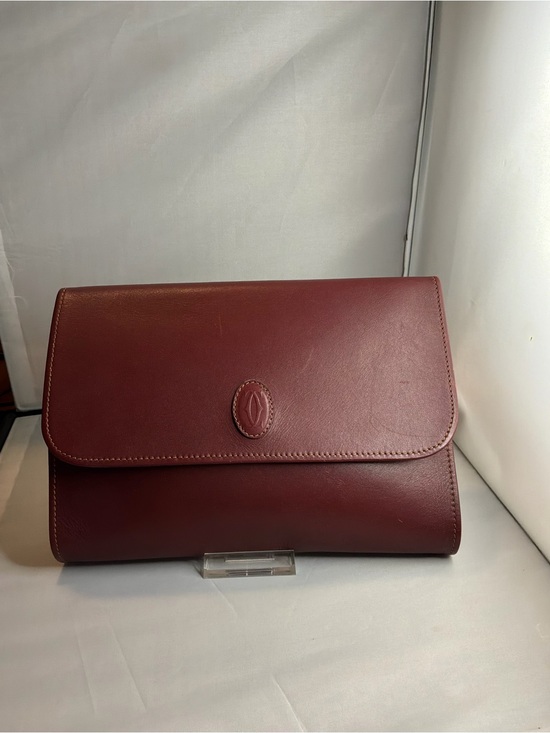 Cartier Handbags - Cartier Leather Clutch in burgundy